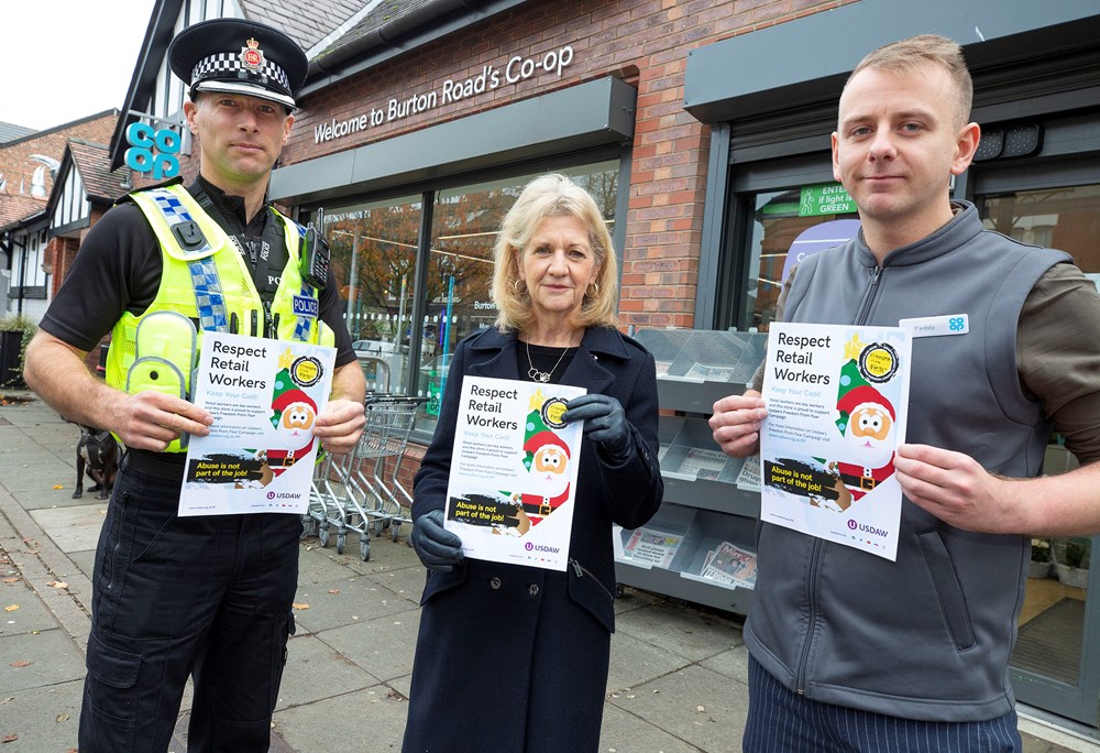 Superintendent Ben Ewart and Deputy Mayor Bev Hughes with Co-op staff member