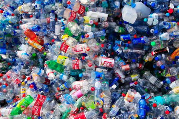 A large pile of plastic bottles