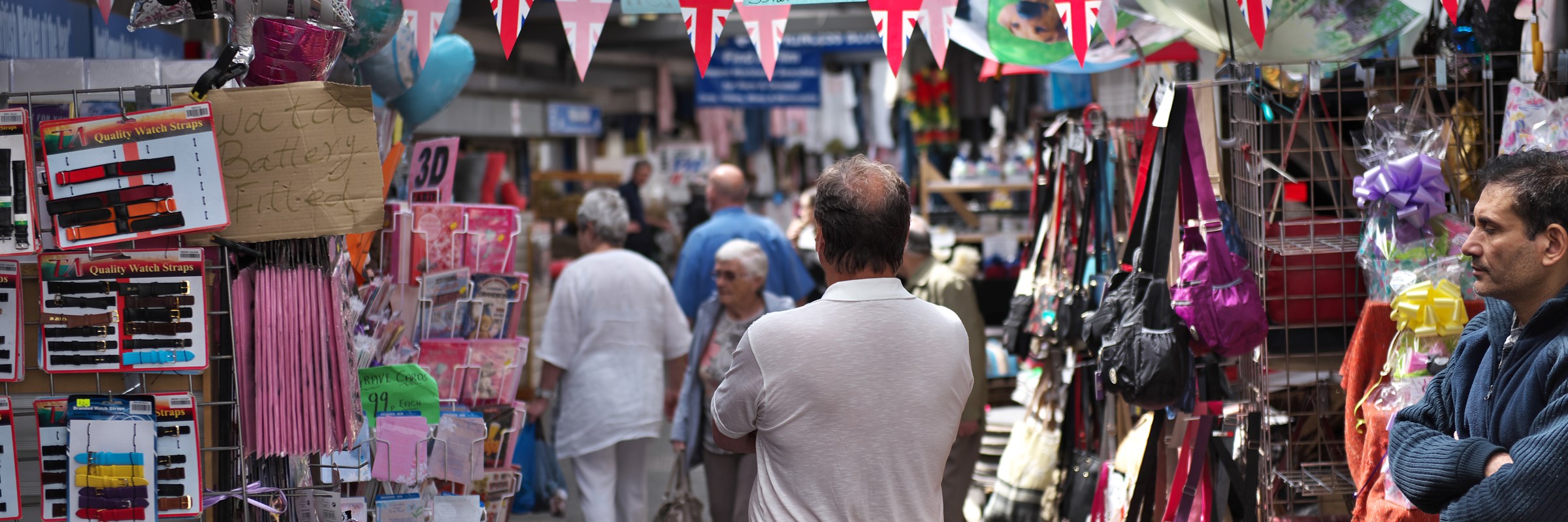 Market stalls and shoppers in Bury