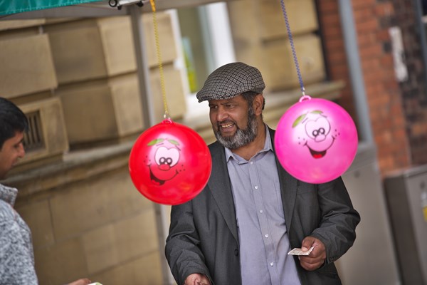 Two men at a market stall in Rochdale