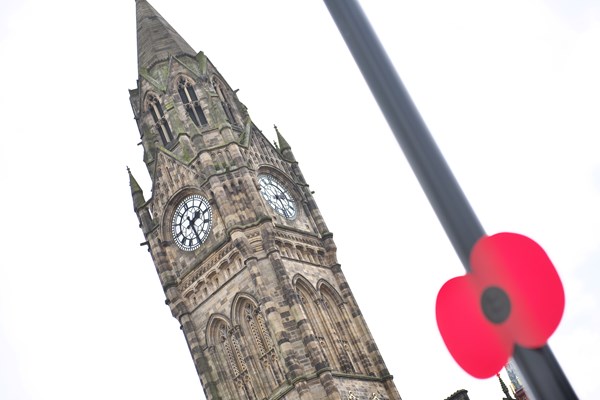 Rochdale Town Hall with a poppy