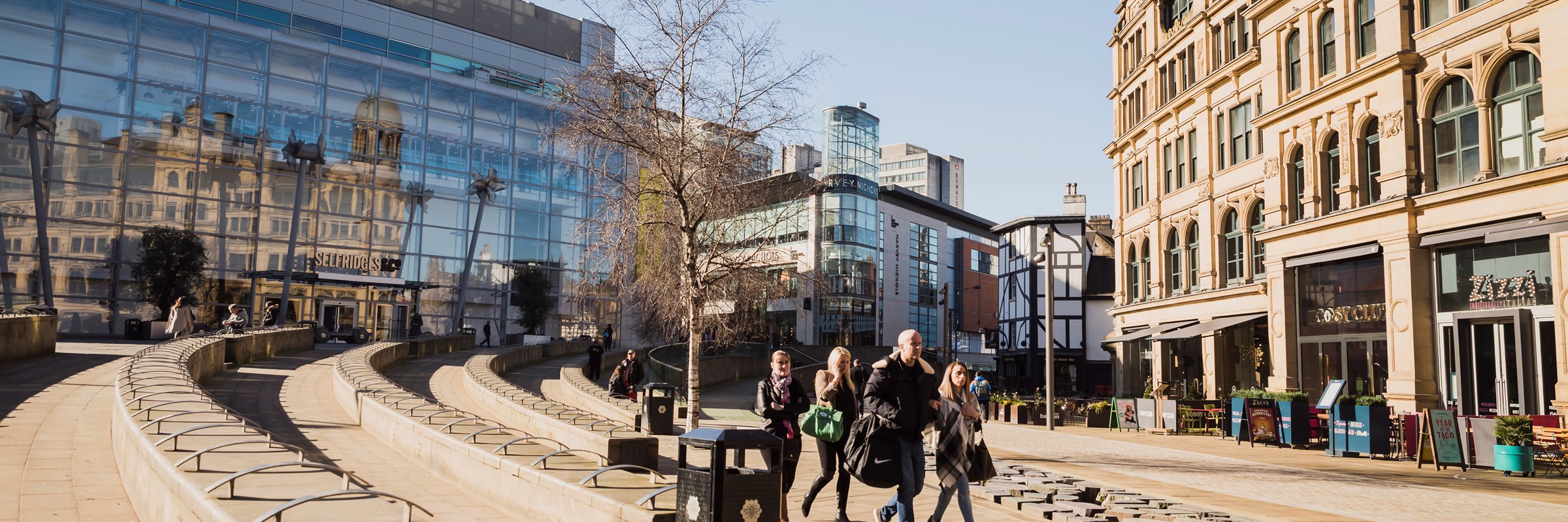 People walking through Exchange Square