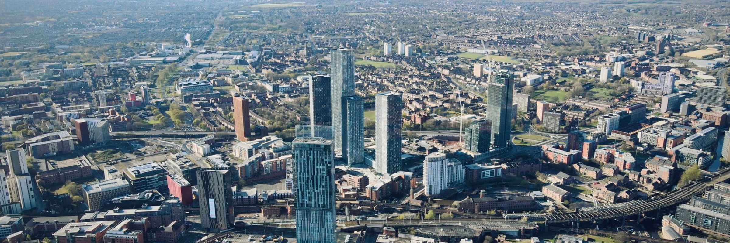 an aerial view of the city of Manchester