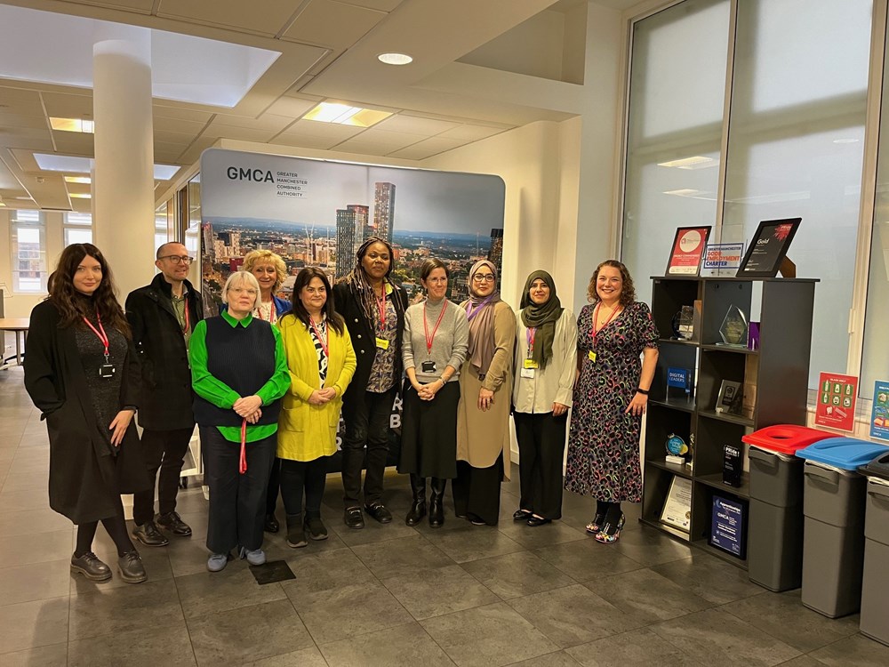 UN Special Rapporteur, Reem Alsalem, stood alongside a group of representatives from organisations within Greater Manchester's VCSE-sector that support people affected by gender-based violence.